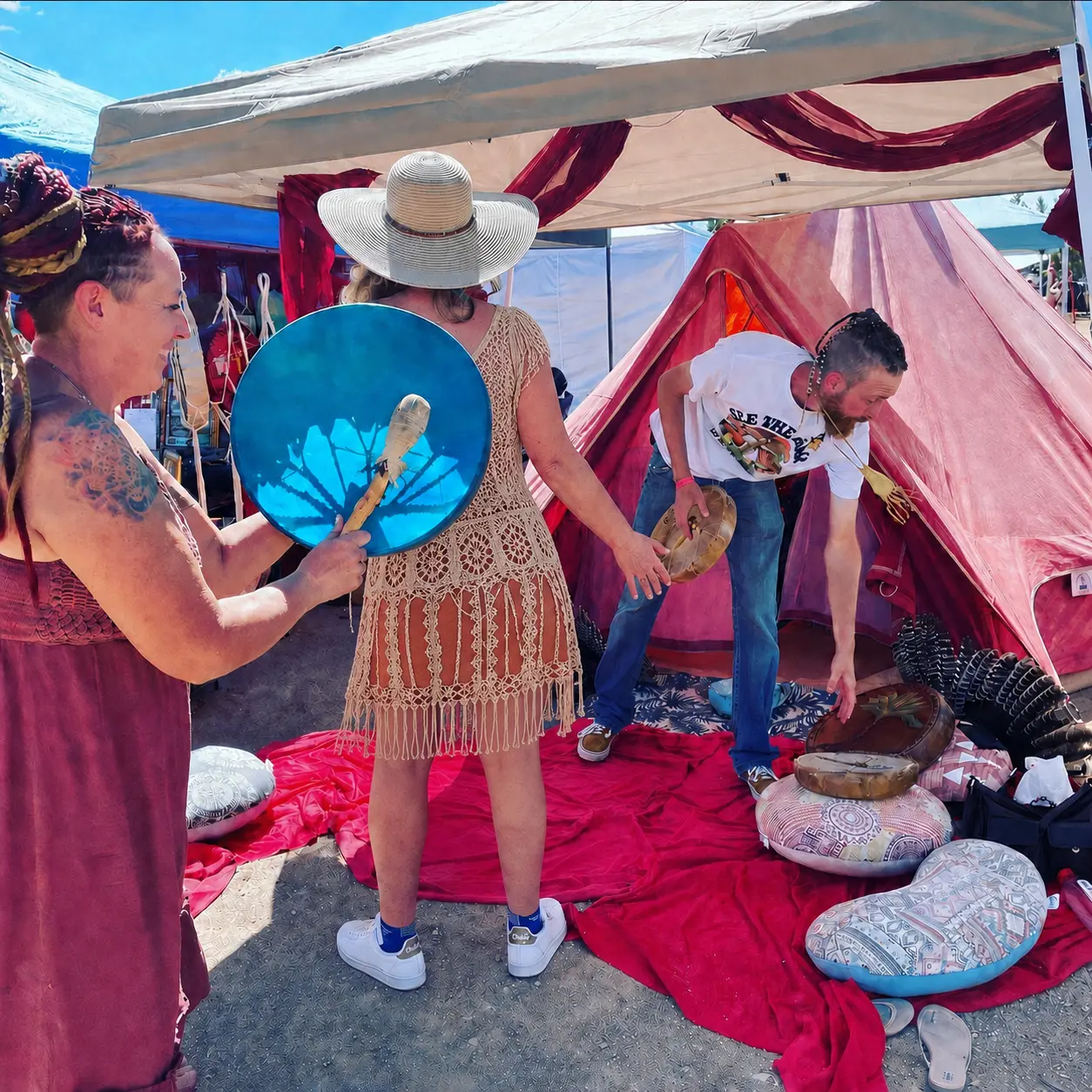 Sacred sound and drum ceremony at an outdoor festival - Yin on Fire.